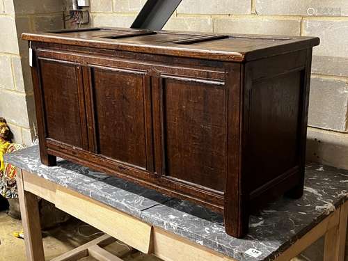 An early 18th century and later panelled oak coffer, length ...