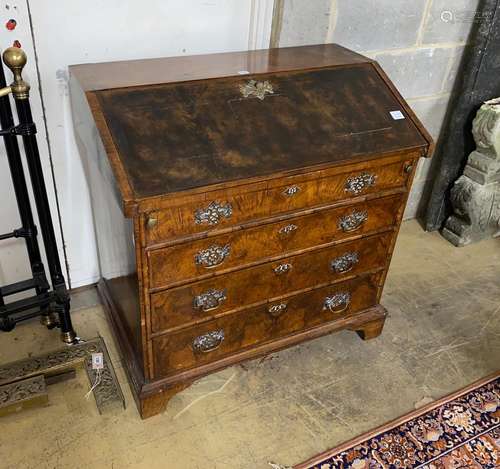 An 18th century walnut veneered bureau, adapted, fitted four...