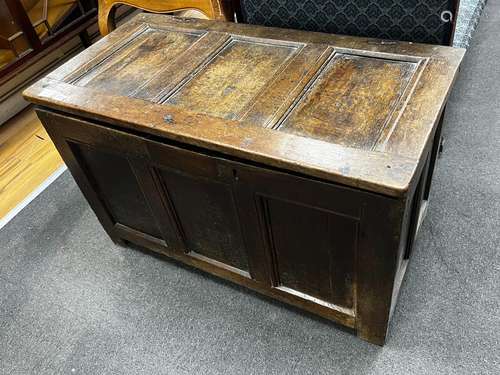 An 18th century panelled oak coffer, length 103cm, depth 53c...