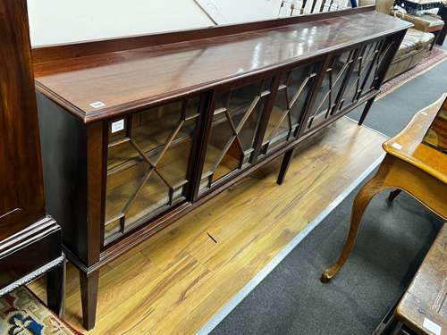 An Edwardian glazed mahogany dwarf bookcase, enclosed by six...