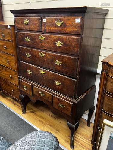 An 18th century oak chest on stand, width 99cm, depth 48cm, ...