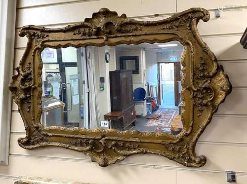 A Victorian giltwood and composition wall mirror, width 90cm...