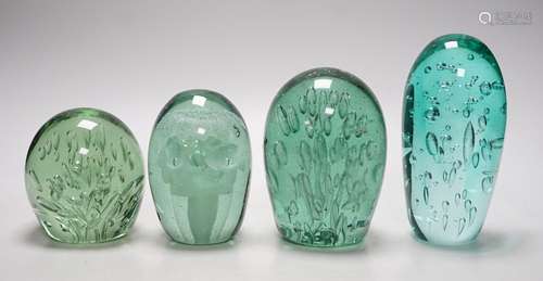 Four 19th century green glass dumps, one floral, tallest 16c...