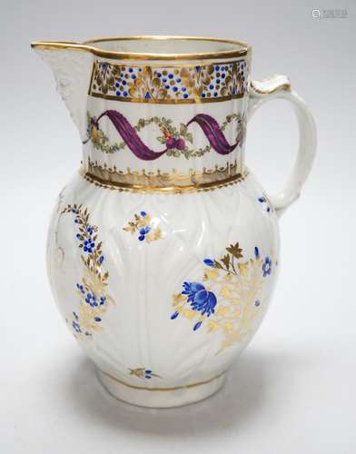 An 18th century Caughley very rare polychrome mask jug, elab...