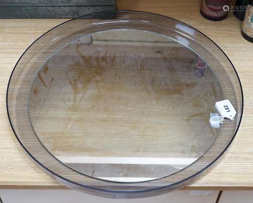 An Italian 1970s circular perspex wall mirror by Guzzini, de...