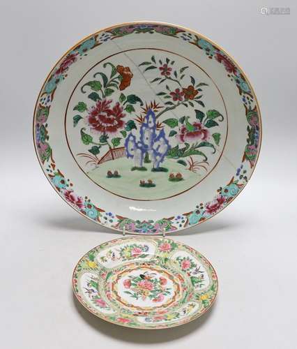 An 18th century Chinese famille rose charger and a Canton pl...