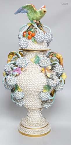 A large 19th century Jacob Petit floral encrusted two handle...