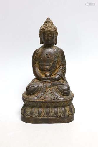 A bronze seated figure of Buddha, 19cms high