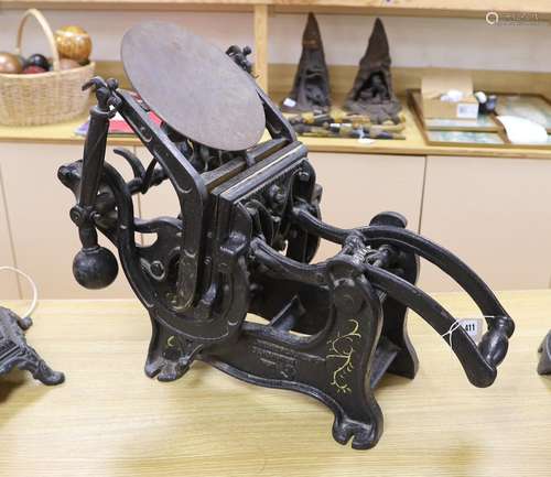 A cast iron printing press, 73cms wide