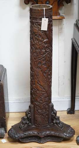 A late 19th century Burmese carved bamboo and wood stand, 84...