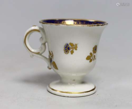 A Caughley rare ice or sorbet cup decorated in blue and gilt...