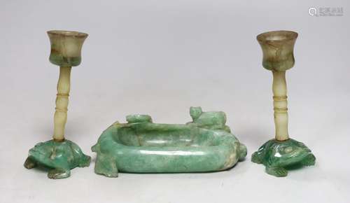 A pair of Chinese jade stemmed and green quartz candlesticks...