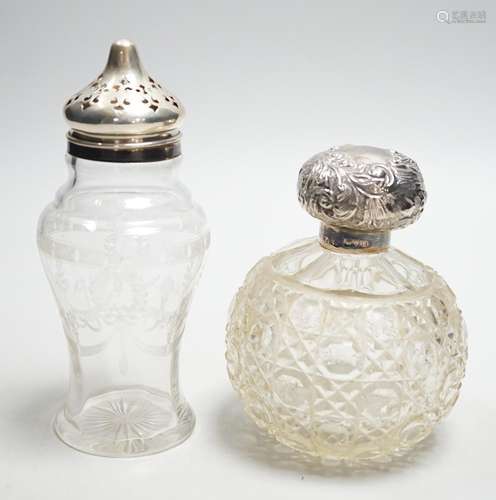 A late Victorian repousse silver mounted cut glass scent bot...