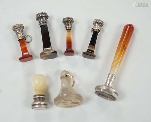 Five assorted 19th century white metal mounted agate seals, ...