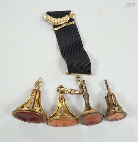 Four assorted 19th century gold plated and agate or hardston...