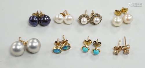 Eight assorted modern pairs of ear studs, including a 14k an...