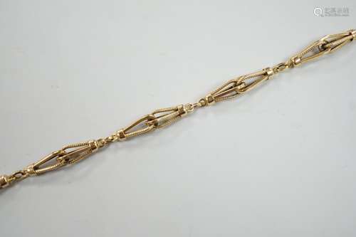 An 18k yellow metal fancy link bracelet with 14k clasp, 21cm...