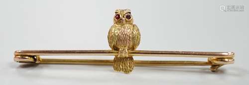 A mid 20th century two colour 9ct owl bar brooch, with caboc...