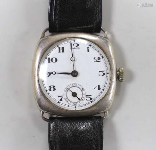 A gentlemans 1920s silver manual wind wrist watch, with Arab...