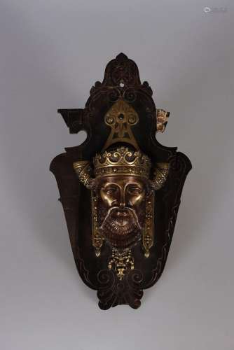 Bénitier en bronze à décor présumé d'une tête de Consta