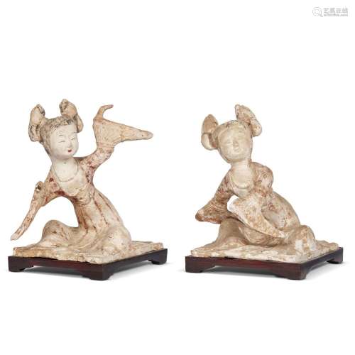A PAIR OF SCULPTURES, CHINA, TANG DYNASTY, 8TH CENTURY<br />...