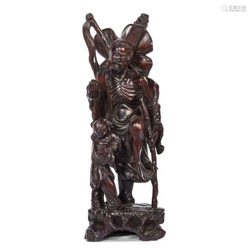 A SCULPTURE, CHINA, QING DYNASTY, 19TH-20TH CENTURIES<br />
...