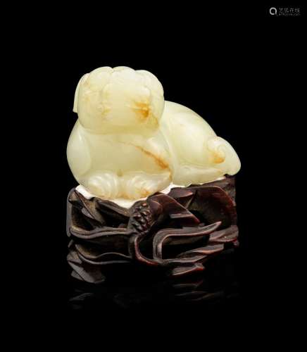 A Carved Russet and White Jade Figure of Mythical Beast, Tia...
