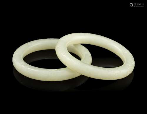 A Pair of Carved White Jade Bangles