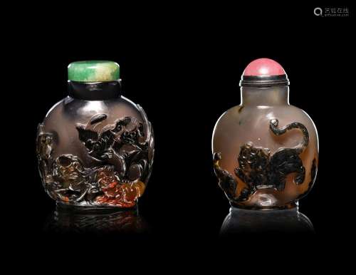 Two Carved Agate 'Fu Lion' Snuff Bottles