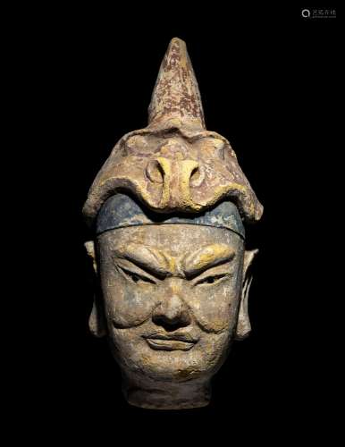 A Polychrome Stucco Head of a Temple Guardian