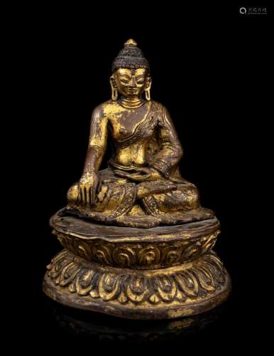 A Nepalese Gilt Bronze Figure of Buddha Shakyamuni