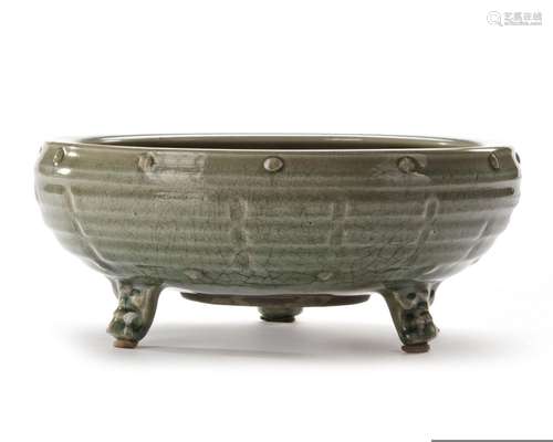 A CHINESE LONGQUAN CELADON 'EIGHT TRIGRAMS' TRIPOD CENSER, L...