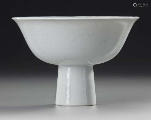 A CHINESE WHITE-GLAZED ANHUA DRAGON STEM CUP, EARLY 18TH CEN...