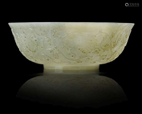 A CHINESE CARVED JADE BOWL, 18TH CENTURY