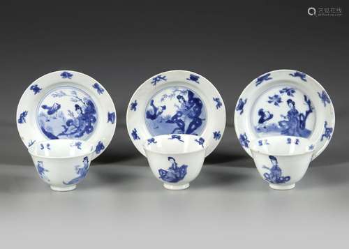 THREE CHINESE BLUE AND WHITE CUPS AND SAUCERS, KANGXI PERIOD...