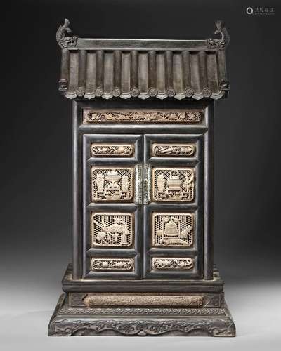 A CHINESE CARVED ZITAN ALTAR CABINET, QING DYNASTY (1644-191...