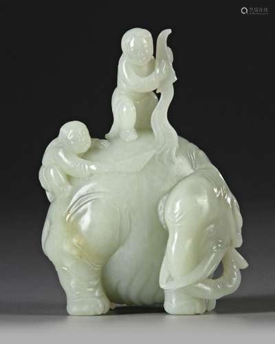 A CELADON JADE CARVING OF TWO BOYS WASHING AN ELEPHANT, 19TH...