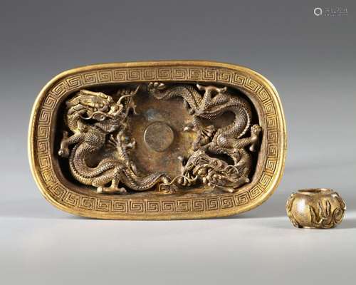 A CHINESE GILT BRONZE DRAGON DRIP PAN, 17TH/18TH CENTURY