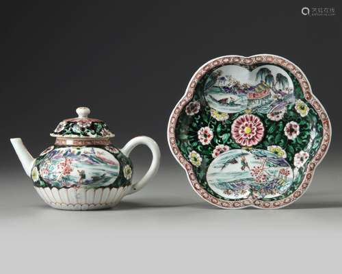 A CHINESE BLACK-GROUND FAMILLE ROSE TEAPOT, COVER AND STAND,...