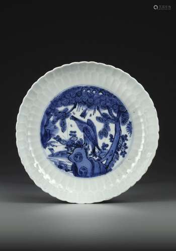 A CHINESE BLUE AND WHITE INCISED DECORATED DISH, WANLI PERIO...