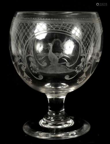AN OVERSIZED LATE GEORGIAN GLASS GOBLET