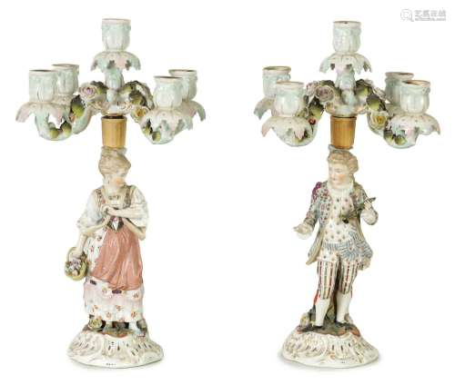 A PAIR OF 19TH CENTURY FIGURAL DRESDEN STYLE PORCELAIN CANDE...
