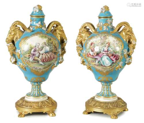 A PAIR OF 19TH CENTURY SEVRES STYLE ORMOLU MOUNTED VASES AND...