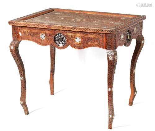 A 19TH-CENTURY CARVED HARDWOOD ISLAMIC CENTRE TABLE