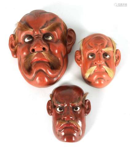 A GROUP OF THREE JAPANESE MEIJI PERIOD LACQUER WORK FACE MAS...
