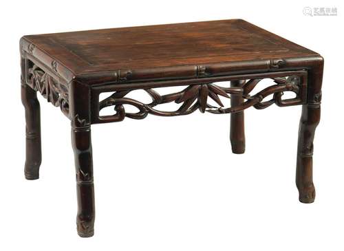 A 19TH CENTURY CHINESE HARDWOOD LOW OCCASIONAL TABLE