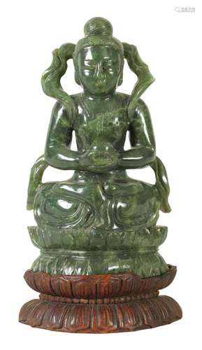 A CHINESE CARVED SAGE GREEN JADE FIGURE OF A BUDDHA DEITY