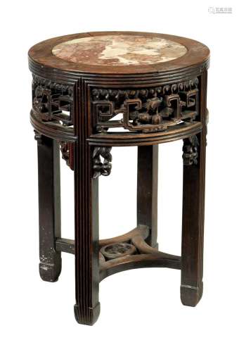 A 19TH CENTURY CHINESE HARDWOOD CIRCULAR JARDINERE TABLE
