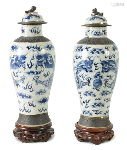 A PAIR OF 19TH CENTURY CHINESE CRACKLE GLAZE LIDDED VASES