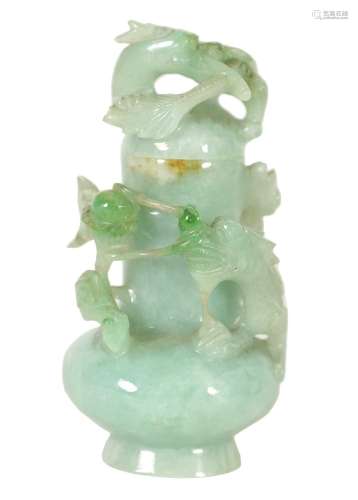 A CHINESE CARVED PALE GREEN JADE LIDDED VASE